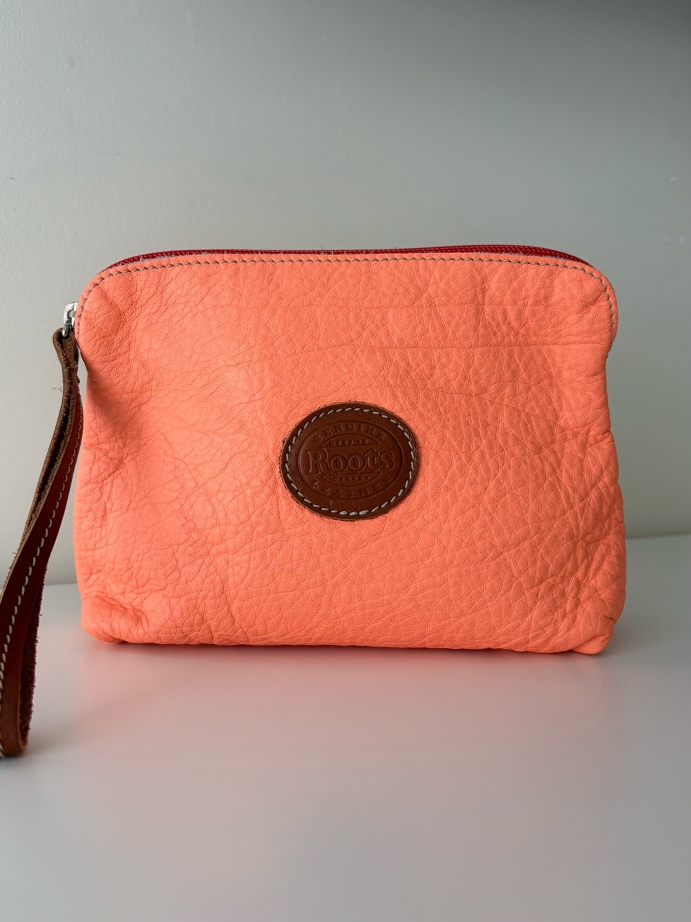 ORANGE ROOTS LEATHER WRISTLET